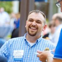 Ben Rapin chatting with guests.